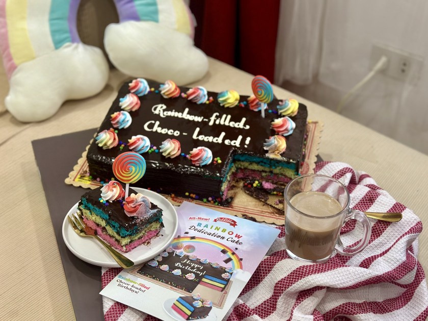 choco-loaded, rainbowfilled birthdays, red ribbon rainbow dedication cake